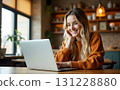 beautiful young female sitting and working in coffee shop with her business lifestyle working  131228880