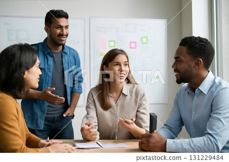 AI generated image showing a diverse team engaged in a collaborative brainstorming session in a bright modern office. Natural expressions, dynamic interactions, and creative energy fill the room. 131229484
