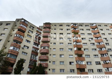 Suburban neighborhood built in communism. Post Soviet concrete flat of blocks Suburban neighborhood built in communism. Post Soviet concrete flat of blocks 131229733