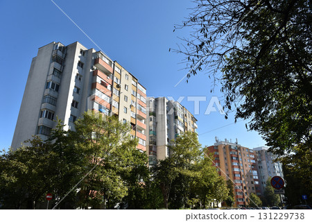 Suburban neighborhood built in communism. Post Soviet concrete flat of blocks 131229738