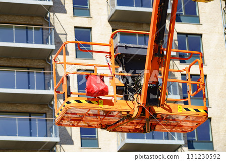 Basket lift on construction site 131230592