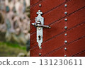 Old vintage wooden doors with metal rivets 131230611