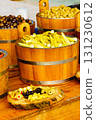 Olives and peppers for sale at market 131230612