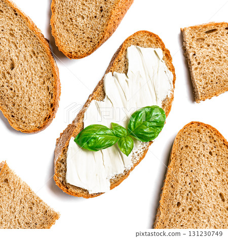 Bread with butter, flat lay on white 131230749