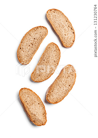 Slices of wheat bread isolated on white background Slices of wheat bread isolated on white background 131230764