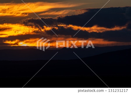 Majestic Sunset Over Wind Turbines on Horizon Majestic Sunset Over Wind Turbines on Horizon 131231217