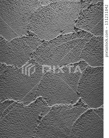 Vertical background image of a dark gray earthen wall with trowel marks Vertical background image of a dark gray earthen wall with trowel marks 131231842