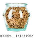Glass jar filled raw pasta isolated on white background. File contains clipping path. 131231962