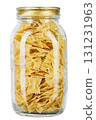 Farfalle pasta in a glass jar for storing bulk products isolated on white background. 131231963