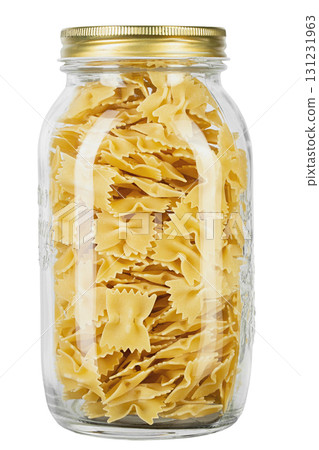 Farfalle pasta in a glass jar for storing bulk products isolated on white background. Farfalle pasta in a glass jar for storing bulk products isolated on white background. 131231963