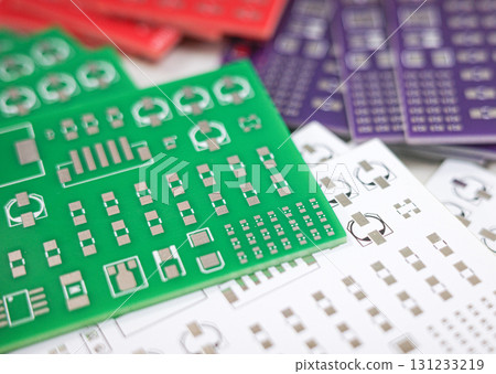 Stack of colorful printed circuit boards for electronic prototyping Stack of colorful printed circuit boards for electronic prototyping 131233219