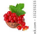 Red currant isolated on white background. Redcurrant or Ribes rubrum ripe berries with green leaves in wooden bowl. 131233233