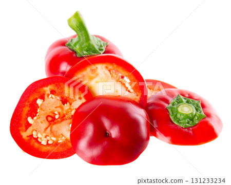 Sweet round peppers isolated on white background. Ripe round red paprika. Clipping path. 131233234