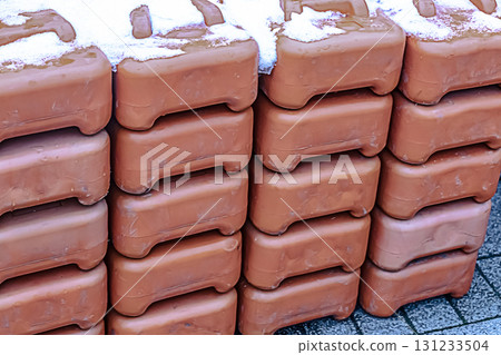 wall of gasoline canister stacked stack background close-up 131233504