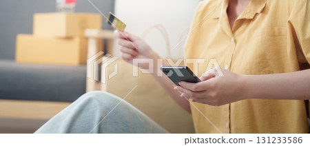 Online Shopping. Using a credit card for mobile purchase. Online Shopping. Using a credit card for mobile purchase. 131233586