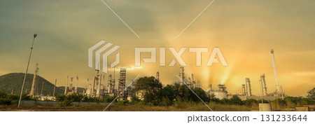 Banner Oil refinery gas petrol plant industry with crude tank, gasoline supply chemical factory. Petroleum barrel fuel heavy industry oil refinery manufacturing factory plant on twilight night time 131233644