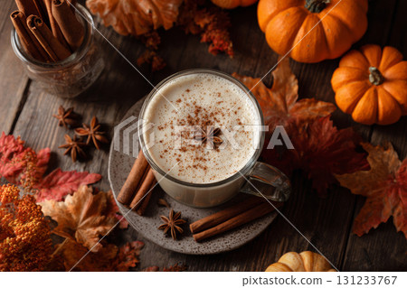 Pumpkin spice latte with cinnamon and autumn leaves 131233767