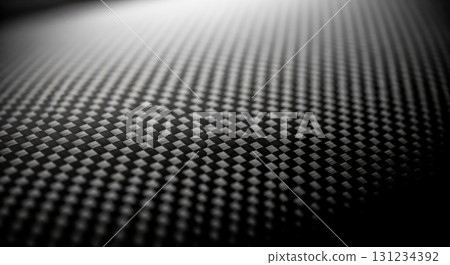 Futuristic composite material surface with woven grid detail perfect for sport car industry or high tech product presentation backdrop 131234392