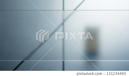 Abstract frosted glass background with blurry silhouette and lines provides modern office interior and minimalist corporate presentation design 131234403