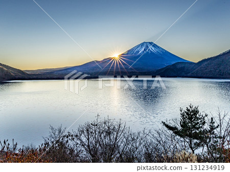 View of the sunrise over Mount Fuji from Lake Motosu 131234919