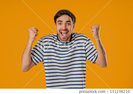 Handsome Surprised Man With Triumph Yes Victory Gesture. Jackpot, Win, Success. 131236210