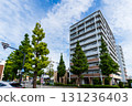 An apartment building facing the national highway under a refreshing autumn sky 131236403