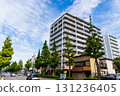 An apartment building facing the national highway under a refreshing autumn sky 131236405