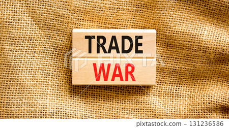 Trade war symbol. Concept word Trade war on beautiful wooden blocks. Beautiful canvas background. Business trade war concept. Copy space. 131236586