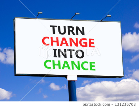 Turn change into chance symbol. Concept words phrase Turn change into chance on beautiful big white billboard. Beautiful blue sky cloud background. Business Turn change into chance concept. Copy space 131236708