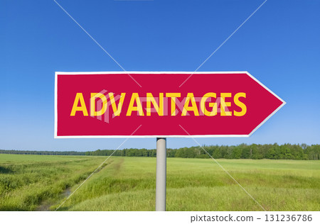 Advantages symbol. Concept word Advantages on beautiful red road sign. Beautiful blue sky green grass and forest peaceful nature background. Business advantages concept. Copy space. 131236786