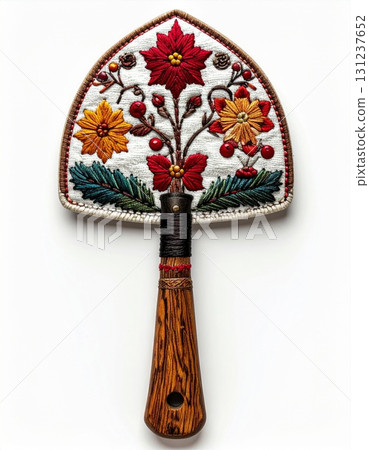 Artisan Needlepoint Trowel Featuring Poinsettia and Floral Motifs with a Decorative Wooden Handle on a White 131237652