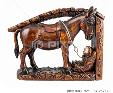 Wooden Nativity Scene with Donkey and Baby Lying in a Manger Dark Brown Carved Texture 131237679