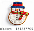Snowman Shaped Cookie with Embroidered Details on a White Background 131237705