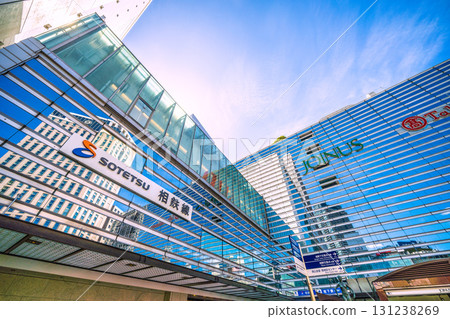 Yokohama cityscape, Japan, September 25th. SOTETSU: A view of the Yokohama Bay Sheraton Hotel and other facilities reflected in the windows of the Sotetsu Line. 131238269