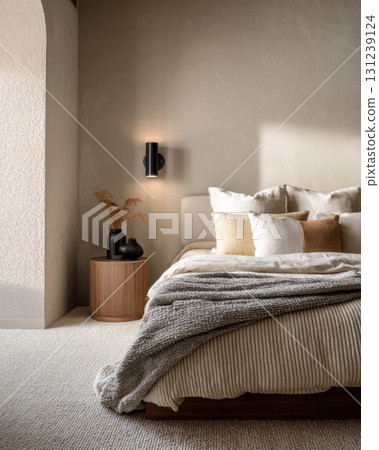 Tranquil, modern bedroom interior featuring minimalist decor. Cozy home furniture and comfortable bed create perfectly serene and restful space for pure relaxation Tranquil, modern bedroom interior featuring minimalist decor. Cozy home furniture and comfortable bed create perfectly serene and restful space for pure relaxation 131239124