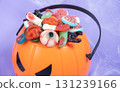 Halloween sweets on pumpkin basket. Halloween 131239166