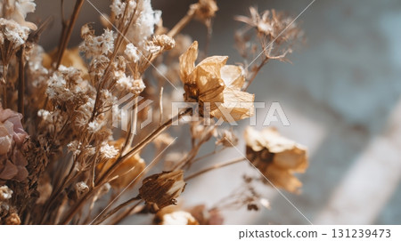 delicate dried flower bouquet in soft earthy tones and natural warm light delicate dried flower bouquet in soft earthy tones and natural warm light 131239473