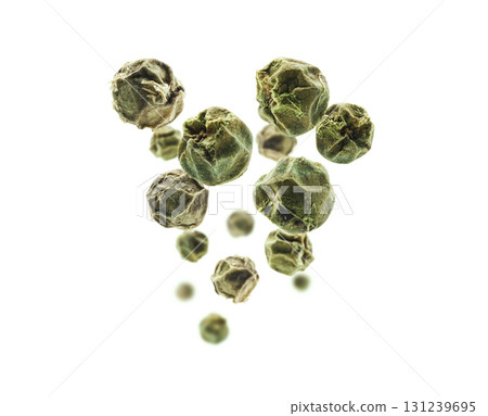Green peppercorns levitate on a white background Green peppercorns levitate on a white background 131239695