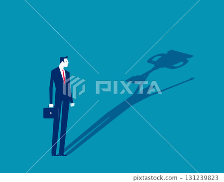 Leader and achievement. Businessman with his shadow holding the trophy 131239823