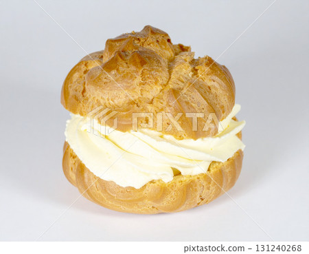 A type of cream puff with cream filling 131240268