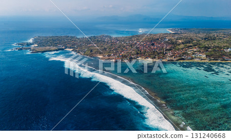 Landscape with crashing waves in ocean and Nusa Lembongan island, drone view Landscape with crashing waves in ocean and Nusa Lembongan island, drone view 131240668