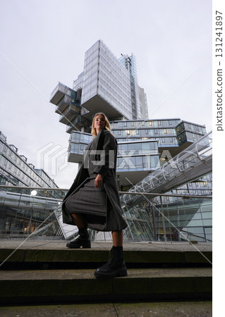 Fashion model walking in modern city Fashion model walking in modern city 131241897