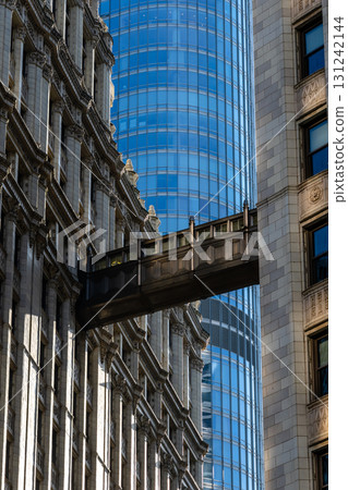 A dramatic view of a sky bridge connecting buildings in the city of Chicago, USA. 131242144