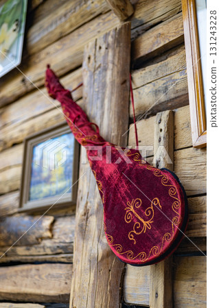 Kyrgyz national musical instrument komuz in an elegant velvet case Kyrgyz national musical instrument komuz in an elegant velvet case 131243228