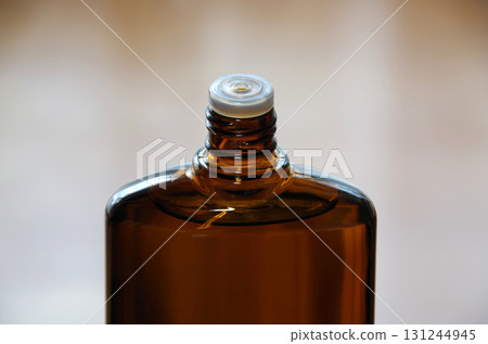 Open bottle of fragrance-free hair growth product containing female hormones Open bottle of fragrance-free hair growth product containing female hormones 131244945