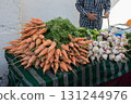 Fresh carrots and white beetroots in a local market. Douz, Tunisia 131244976