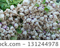 Backgrounds. Pile of organic turnips in a market 131244978