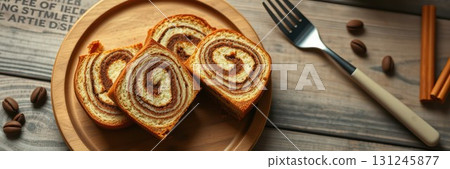 Delicious swirl bread with cinnamon and chocolate served on a wooden platter in a cozy setting 131245877