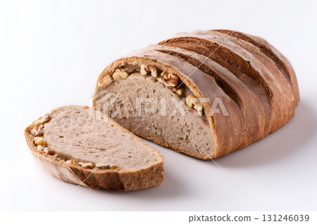 Rustic Walnut Bread with Slice on Wooden Surface 131246039