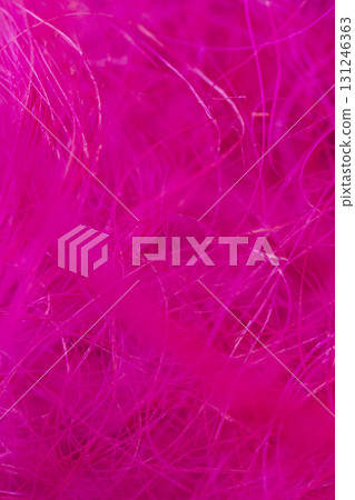 pink threads for creativity closeup, artificial threads dyed red for decorative work and creative work of artisans pink threads for creativity closeup, artificial threads dyed red for decorative work and creative work of artisans 131246363